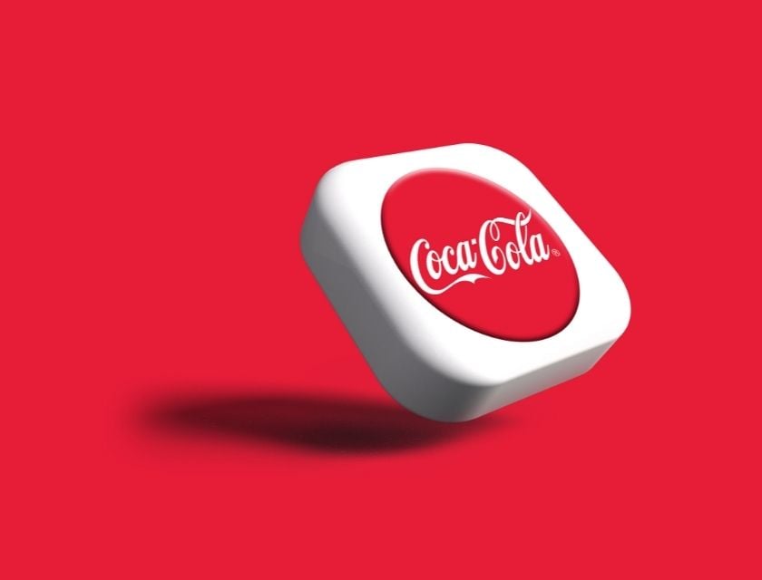 Coca-cola logo design in a box with red background