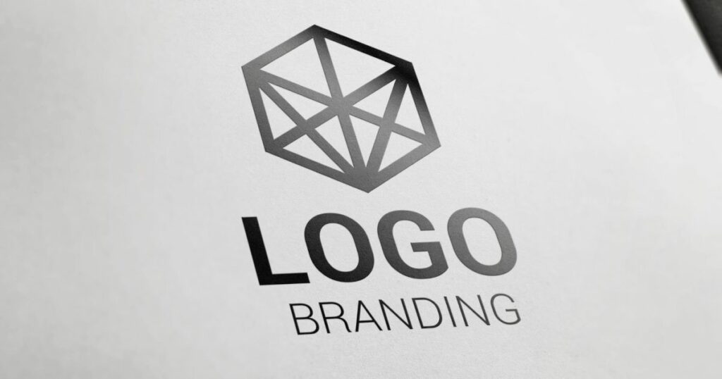 Logo branding written at the center of a a white paper