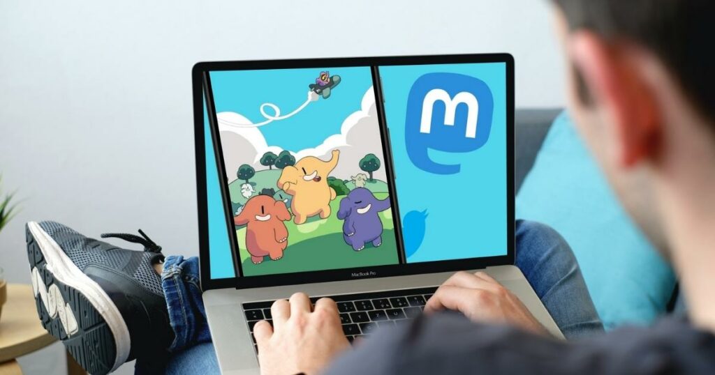 man using mastodon app on laptop