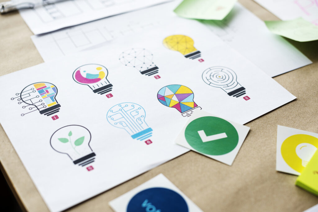 brand imagery with the green light bulb that shows the idea, and green checkmark 