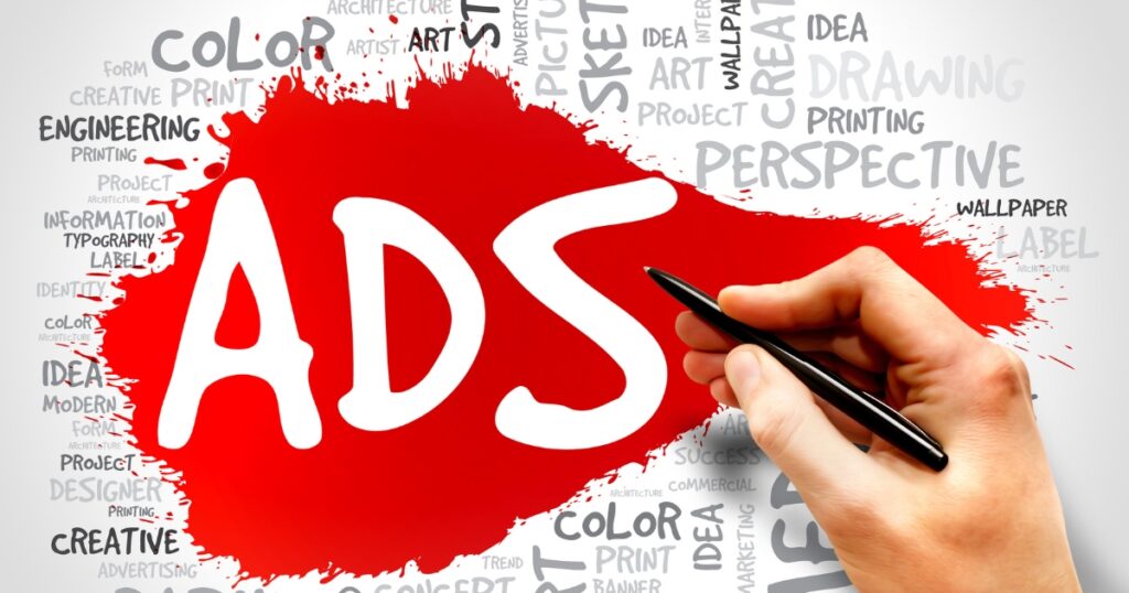 pen sketch with the word 'ads' written in the middle and red background splash throughout the other words or elements backward