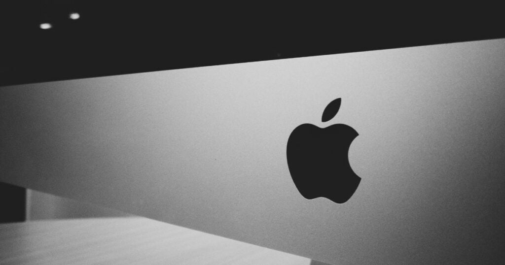 apple logo on a gray background of the brand